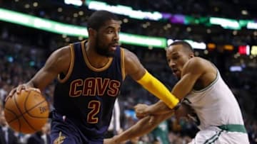 Apr 23, 2015; Boston, MA, USA; Cleveland Cavaliers guard Kyrie Irving (2) drivers the ball against Boston Celtics guard Avery Bradley (0) during the second half in game three of the first round of the NBA Playoffs at TD Garden. The Cavaliers defeated the Celtics 103-95. Mandatory Credit: David Butler II-USA TODAY Sports