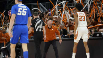Dec 1, 2022; Austin, Texas, USA; Texas Longhorns head coach Chris Beard (center) yells out to forward Dillon Mitchell (23) during the first half against the Creighton Bluejays at Moody Center. Mandatory Credit: Scott Wachter-USA TODAY Sports