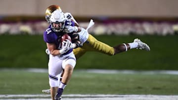 EVANSTON, IL - NOVEMBER 03: James Prather #44 of the Northwestern Wildcats is brought down by Julian Okwara #42 of the Notre Dame Fighting Irish during the first half of a game at Ryan Field on November 3, 2018 in Evanston, Illinois. (Photo by Stacy Revere/Getty Images)