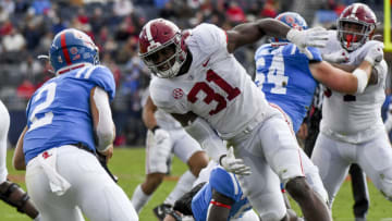 Nov 12, 2022; Oxford, Mississippi, USA; Alabama linebacker Will Anderson Jr. (31) pressures Ole Miss quarterback Jaxson Dart (2) at Vaught-Hemingway Stadium. Mandatory Credit: Gary Cosby Jr.-USA TODAY Sports