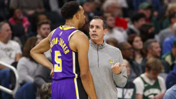 Nov 17, 2021; Milwaukee, Wisconsin, USA; Los Angeles Lakers head coach Frank Vogel talks with guard Talen Horton-Tucker (5) during the first quarter against the Milwaukee Bucks at Fiserv Forum. Mandatory Credit: Jeff Hanisch-USA TODAY Sports