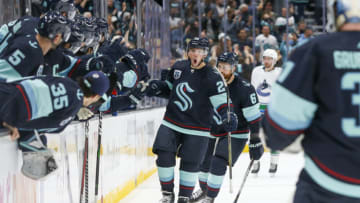 Oct 23, 2021; Seattle, Washington, USA; Seattle Kraken defenseman Vince Dunn (29) celebrates with teammates after scoring a goal against the Vancouver Canucks during the first period at Climate Pledge Arena. Mandatory Credit: Joe Nicholson-USA TODAY Sports