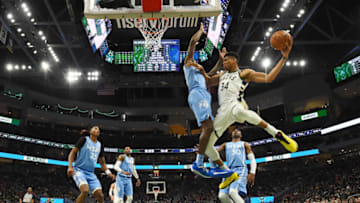 Giannis Antetokounmpo of the Milwaukee Bucks is defended by Josh Okogie of the Minnesota Timberwolves. (Photo by Stacy Revere/Getty Images)