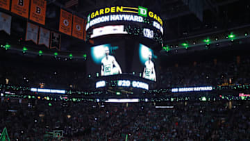 BOSTON - OCTOBER 18: Fans cheers when a photo of Boston Celtics forward Gordon Hayward, who was injured the previous night during the team's season-opening game in Cleveland, is shown on the scoreboard before the game. The Boston Celtics host the Milwaukee Bucks in the team's home season opener at TD Garden in Boston on Oct. 18, 2017. (Photo by Jim Davis/The Boston Globe via Getty Images)