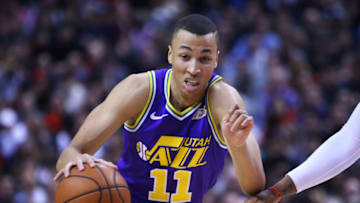 TORONTO, ON - JANUARY 1: Dante Exum #11 of the Utah Jazz dribbles the ball during the second half of an NBA game against the Toronto Raptors at Scotiabank Arena on January 1, 2019 in Toronto, Canada. (Photo by Vaughn Ridley/Getty Images)