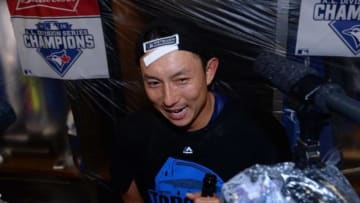 Oct 14, 2015; Toronto, Ontario, CAN; Toronto Blue Jays second baseman Munenori Kawasaki (66) talks with the media in the club house at the end of game five against the Texas Rangers in the ALDS at Rogers Centre. Mandatory Credit: Nick Turchiaro-USA TODAY Sports