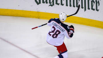 WASHINGTON, DC - APRIL 21: Columbus Blue Jackets right wing Oliver Bjorkstrand (28) reacts after scoring a game tying goal in the third period against the Washington Capitals on April 21, 2018, at the Capital One Arena in Washington, D.C. in the First Round of the Stanley Cup Playoffs. The Washington Capitals defeated the Columbus Blue Jackets, 4-3 in overtime.(Photo by Mark Goldman/Icon Sportswire via Getty Images)