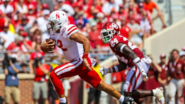 Sep 18, 2021; Norman, Oklahoma, USA; Nebraska Cornhuskers quarterback Adrian Martinez (2) runs past Oklahoma Sooners linebacker Brian Asamoah (24) during the third quarter at Gaylord Family-Oklahoma Memorial Stadium. Mandatory Credit: Kevin Jairaj-USA TODAY Sports