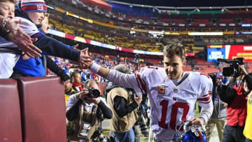 Jan 1, 2017; Landover, MD, USA; New York Giants quarterback Eli Manning (10) leaves the field after the game against the Washington Redskins at FedEx Field. Mandatory Credit: Brad Mills-USA TODAY Sports