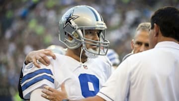 Aug 25, 2016; Seattle, WA, USA; Dallas Cowboys quarterback Tony Romo (9) is attended to after getting injured during the first quarter during a preseason game against the Seattle Seahawks at CenturyLink Field. Mandatory Credit: Troy Wayrynen-USA TODAY Sports
