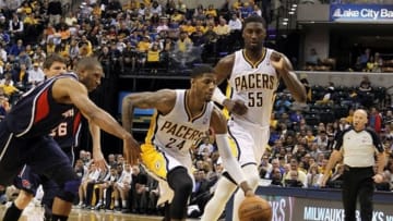 Apr 21, 2013; Indianapolis, IN, USA; Indiana Pacers forward Paul George (24) drives to the basket against Atlanta Hawks center Al Horford (15) during game one of the first round of the 2013 NBA Playoffs at Bankers Life Fieldhouse. Indiana defeats Atlanta 107-90. Mandatory Credit: Brian Spurlock-USA TODAY Sports