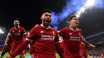 MANCHESTER, ENGLAND - APRIL 10: Alex Oxlade-Chamberlain of Liverpool celebrates after his sides first goal during the UEFA Champions League Quarter Final Second Leg match between Manchester City and Liverpool at Etihad Stadium on April 10, 2018 in Manchester, England. (Photo by Laurence Griffiths/Getty Images,)