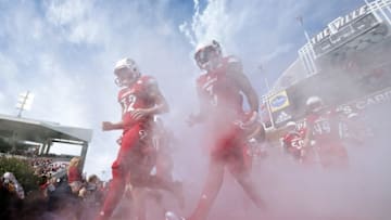 Nov 7, 2015; Louisville, KY, USA; Louisville Cardinals place kicker Blanton Creque (32) and wide receiver Pat Thomas (3) onto the field before the firs quarter against the Syracuse Orange at Papa John