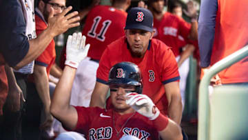 BOSTON, MA - JUNE 28: Hunter Renfroe #10 of the Boston Red Sox is pushed in a laundry cart after hitting a two-run home run during the fourth inning of a game against the Kansas City Royals on June 28, 2021 at Fenway Park in Boston, Massachusetts. (Photo by Billie Weiss/Boston Red Sox/Getty Images)