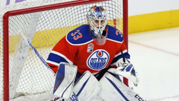Oct 26, 2016; Edmonton, Alberta, CAN; Edmonton Oilers goaltender Cam Talbot (33) makes a save against warm-up against the Washington Capitals at Rogers Place. Mandatory Credit: Perry Nelson-USA TODAY Sports