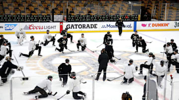 BOSTON - MAY 28: The Boston Bruins gather at center ice following an abbreviated practice at TD Garden in Boston in preparation for Game 2 of the Stanley Cup Finals on May 28, 2019. (Photo by Barry Chin/The Boston Globe via Getty Images)