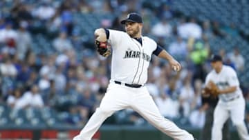 Jul 19, 2016; Seattle, WA, USA; Seattle Mariners starting pitcher Wade Miley (20) throws against the Chicago White Sox during the first inning at Safeco Field. Mandatory Credit: Joe Nicholson-USA TODAY Sports