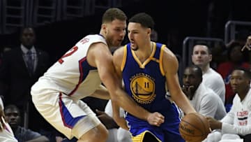 Dec 7, 2016; Los Angeles, CA, USA; Golden State Warriors guard Klay Thompson (11) drives against LA Clippers forward Blake Griffin (32) in the fourth quarter at Staples Center. Mandatory Credit: Richard Mackson-USA TODAY Sports