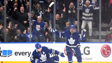 May 2, 2022; Toronto, Ontario, CAN; Toronto Maple Leafs forward Mitchell Marner (16) celebrates with forward Auston Matthews (34) after scoring a goal against the Tampa Bay Lightning in game one of the first round of the 2022 Stanley Cup Playoffs at Scotiabank Arena. Mandatory Credit: Dan Hamilton-USA TODAY Sports