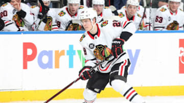 NEW YORK, NY - JANUARY 17: Henri Jokiharju #28 of the Chicago Blackhawks skates with the puck against the New York Rangers at Madison Square Garden on January 17, 2019 in New York City. (Photo by Jared Silber/NHLI via Getty Images)