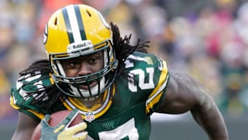 Green Bay Packers running back Eddie Lacy (27) runs the ball during their game Sunday, November 24, 2013 at Lambeau Field in Green Bay, Wis. The Green Bay Packers tied the Minnesota Vikings 26-26.Mjs Packers25 76 Of Hoffman 34869207