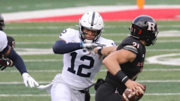 Brandon Smith of Penn State sacks quarterback Johnny Lanngan of Rutgers in the first half during a Big Ten college football match up that saw Penn State defeat Rutgers 23-7 in Piscataway, NJ on December 5, 2020.Big Ten College Football Penn State At Rutgers In Piscataway Nj On December 5 2020