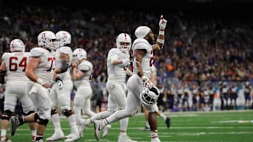 SAN ANTONIO, TX - DECEMBER 28: Bryce Love #20 of the Stanford Cardinal celebrates after scoring a touchdown in the first quarter against the TCU Horned Frogs during the Valero Alamo Bowl at the Alamodome on December 28, 2017 in San Antonio, Texas. (Photo by Tim Warner/Getty Images)