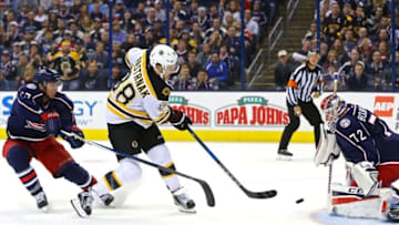 Oct 13, 2016; Columbus, OH, USA; Boston Bruins left wing David Pastrnak (88) shoots a shot against Columbus Blue Jackets defenseman Ryan Murray (27) and goalie Sergei Bobrovsky (72) in the third period at Nationwide Arena. The Bruins won 6-3. Mandatory Credit: Aaron Doster-USA TODAY Sports