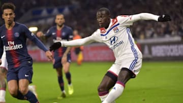 Lyon's French defender Ferland Mendy (R) shoots the ball next to Paris Saint-Germain's German defender Thilo Kehrer during the French L1 football match between Olympique Lyonnais (OL) and Paris-Saint Germain (PSG) at Groupama stadium in Decines-Charpieu, near Lyon, on February 3, 2019. (Photo by ROMAIN LAFABREGUE / AFP) (Photo credit should read ROMAIN LAFABREGUE/AFP/Getty Images)