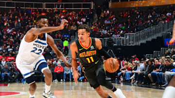 ATLANTA, GA - NOVEMBER 25: Trae Young #11 of the Atlanta Hawks handles the ball against the Minnesota Timberwolves on November 25, 2019 at State Farm Arena in Atlanta, Georgia. NOTE TO USER: User expressly acknowledges and agrees that, by downloading and/or using this Photograph, user is consenting to the terms and conditions of the Getty Images License Agreement. Mandatory Copyright Notice: Copyright 2019 NBAE (Photo by Scott Cunningham/NBAE via Getty Images)