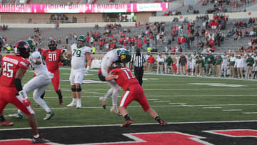 Nov 14, 2020; Lubbock, Texas, USA; Texas Tech Red Raiders defensive line back Colin Schooler (17) stops Baylor Bears quarterback Charlie Brewer (5) at the goal line in the second half at Jones AT&T Stadium. Mandatory Credit: Michael C. Johnson-USA TODAY Sports