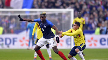 PARIS, FRANCE - MARCH 23: Paul Pogba of France and Juan Fernando Quintero of Colombia fight for the ball during the international friendly match between France and Colombia at Stade de France on March 23, 2018 in Paris, France. (Photo by Aurelien Meunier/Getty Images)