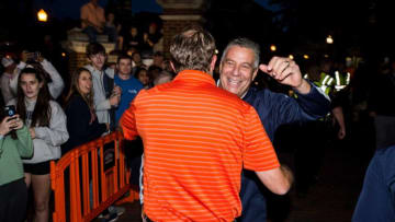 Auburn football coach Gus Malzahn greets Auburn head men's basketball coach Bruce Pearl during the inaugural Auburn basketball Tipoff at Toomer's in Auburn, Ala., on Thursday, Oct. 17, 2019.Jc Tipofftoomers 03