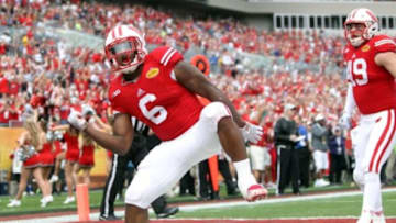 Jan 1, 2015; Tampa, FL, USA; Wisconsin Badgers running back Corey Clement (6) reacts after he ran the ball in for a touchdown against the Auburn Tigers during the first quarter in the 2015 Outback Bowl at Raymond James Stadium. Mandatory Credit: Kim Klement-USA TODAY Sports