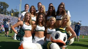 Oct 11, 2014; Pasadena, CA, USA; Oregon Ducks cheerleaders and mascot Puddles pose during the game against the UCLA Bruins at Rose Bowl. Oregon defeated UCLA 42-30. Mandatory Credit: Kirby Lee-USA TODAY Sports