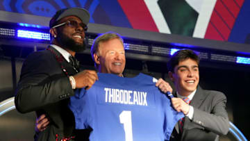Apr 28, 2022; Las Vegas, NV, USA; Oregon defensive end Kayvon Thibodeaux with NFL commissioner Roger Goodell and New York Giants fan Sam Prince after being selected as the fifth overall pick to the New York Giants during the first round of the 2022 NFL Draft at the NFL Draft Theater. Mandatory Credit: Kirby Lee-USA TODAY Sports
