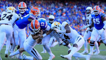 Feleipe Franks #13 of the Florida football Gators rushes for yardage. (Photo by Sam Greenwood/Getty Images)