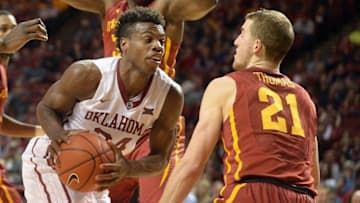 Jan 2, 2016; Norman, OK, USA; Oklahoma Sooners guard Buddy Hield (24) drives to the basket against Iowa State Cyclones guard Matt Thomas (21) during the second half at Lloyd Noble Center. Mandatory Credit: Mark D. Smith-USA TODAY Sports