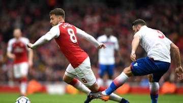 LONDON, ENGLAND - APRIL 01: Erik Pieters of Stoke City fouls Aaron Ramsey of Arsenal during the Premier League match between Arsenal and Stoke City at Emirates Stadium on April 1, 2018 in London, England. (Photo by Mike Hewitt/Getty Images)