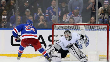 NEW YORK, NY - JANUARY 24: Adam Fox #23 of the New York Rangers scores the game winning goal against Jonathan Quick #32 of the Los Angeles Kings in a shootout at Madison Square Garden on January 24, 2022 in New York City. The Rangers defeated the Kings 3-2. (Photo by Brad Penner/Getty Images)
