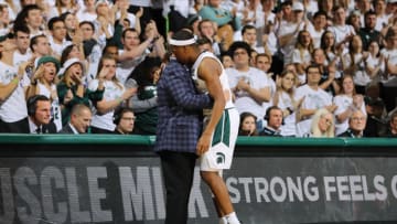EAST LANSING, MI - NOVEMBER 10: Head coach Tom Izzo of the Michigan State Spartans hugs Cassius Winston #5 during the second half against the Binghamton Bearcats at Breslin Center on November 10, 2019 in East Lansing, Michigan. (Photo by Rey Del Rio/Getty Images)