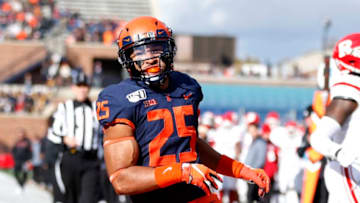 CHAMPAIGN, ILLINOIS - NOVEMBER 02: Dre Brown #25 of the Illinois Fighting Illini runs the ball for a touchdown in the game against the Rutgers Scarlet Knights at Memorial Stadium on November 02, 2019 in Champaign, Illinois. (Photo by Justin Casterline/Getty Images)
