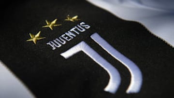 MANCHESTER, ENGLAND - MAY 06: The Juventus club crest on the first team home shirt displayed on May 6, 2020 in Manchester, England (Photo by Visionhaus)