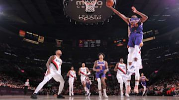 PORTLAND, OR - OCTOBER 12: Mikal Bridges #25 of the Phoenix Suns shoots the ball against the Portland Trail Blazers during a pre-season game on October 12, 2019 at the Moda Center in Portland, Oregon. NOTE TO USER: User expressly acknowledges and agrees that, by downloading and or using this Photograph, user is consenting to the terms and conditions of the Getty Images License Agreement. Mandatory Copyright Notice: Copyright 2019 NBAE (Photo by Sam Forencich/NBAE via Getty Images)