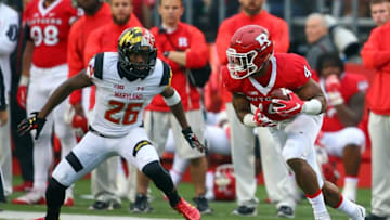 Nov 28, 2015; Piscataway, NJ, USA; Rutgers Scarlet Knights wide receiver Leonte Carroo (4) runs with the ball while Maryland Terrapins defensive back Darnell Savage Jr. (26) defends during the second half at High Points Solutions Stadium. Maryland defeated Rutgers 46-41. Mandatory Credit: Ed Mulholland-USA TODAY Sports