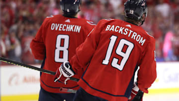 WASHINGTON, DC - APRIL 20: Alex Ovechkin #8 of the Washington Capitals and Nicklas Backstrom #19 of the Washington Capitals look on against the Carolina Hurricanes in the third period in Game Five of the Eastern Conference First Round during the 2019 NHL Stanley Cup Playoffs at Capital One Arena on April 20, 2019 in Washington, DC. (Photo by Patrick Smith/Getty Images)