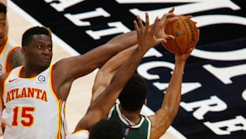 ATLANTA, GEORGIA - APRIL 25: Center Clint Capela #15 and forward Solomon Hill #18 of the Atlanta Hawks block a shot by Giannis Antetokounmpo #34 the Milwaukee Bucks during the game at State Farm Arena on April 25, 2021 in Atlanta, Georgia. NOTE TO USER: User expressly acknowledges and agrees that, by downloading and or using this photograph, User is consenting to the terms and conditions of the Getty Images License Agreement. (Photo by Michael Zarrilli/Getty Images)