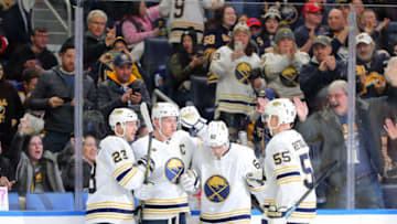 Feb 13, 2020; Buffalo, New York, USA; Buffalo Sabres center Jack Eichel (9) celebrates his goal with teammates during the second period against the Columbus Blue Jackets at KeyBank Center. Mandatory Credit: Timothy T. Ludwig-USA TODAY Sports