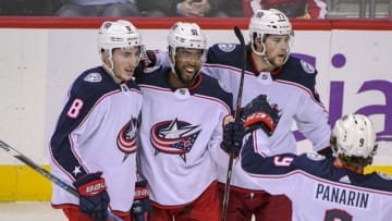 WASHINGTON, DC - NOVEMBER 09: Columbus Blue Jackets left wing Anthony Duclair (91) is congratulated by defenseman Zach Werenski (8), right wing Josh Anderson (77) after scoring the game wining goal in the third period against the Washington Capitals on November 9, 2018, at the Capital One Arena in Washington, D.C. (Photo by Mark Goldman/Icon Sportswire via Getty Images)