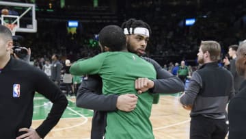 BOSTON, MA - JANUARY 7: D'Angelo Russell #1 of the Brooklyn Nets and Kyrie Irving #11 of the Boston Celtics hug before the game on January 7, 2019 at the TD Garden in Boston, Massachusetts. NOTE TO USER: User expressly acknowledges and agrees that, by downloading and or using this photograph, User is consenting to the terms and conditions of the Getty Images License Agreement. Mandatory Copyright Notice: Copyright 2019 NBAE (Photo by Brian Babineau/NBAE via Getty Images)